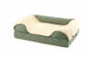 Plush grey and fur blanket on a green bolster bed 36