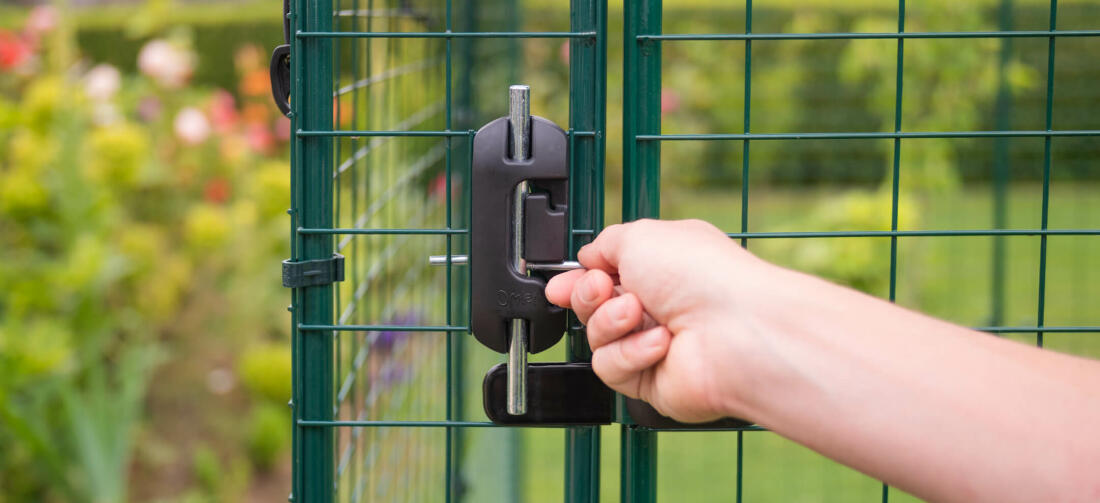 A woman locking the door of a walk in run