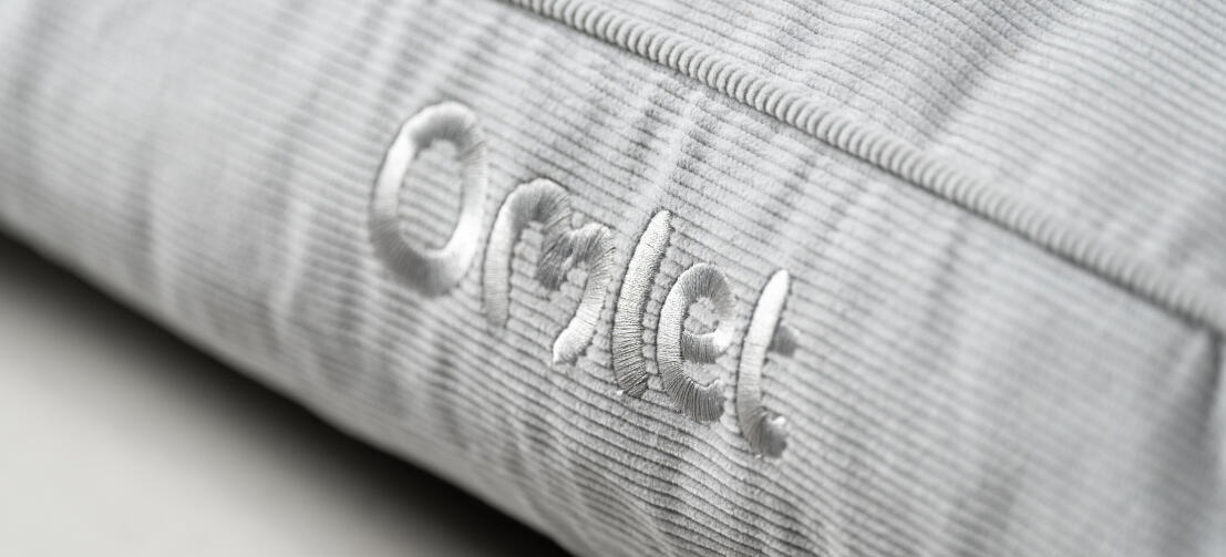 Close up of the corduroy pebble cushion dog bed