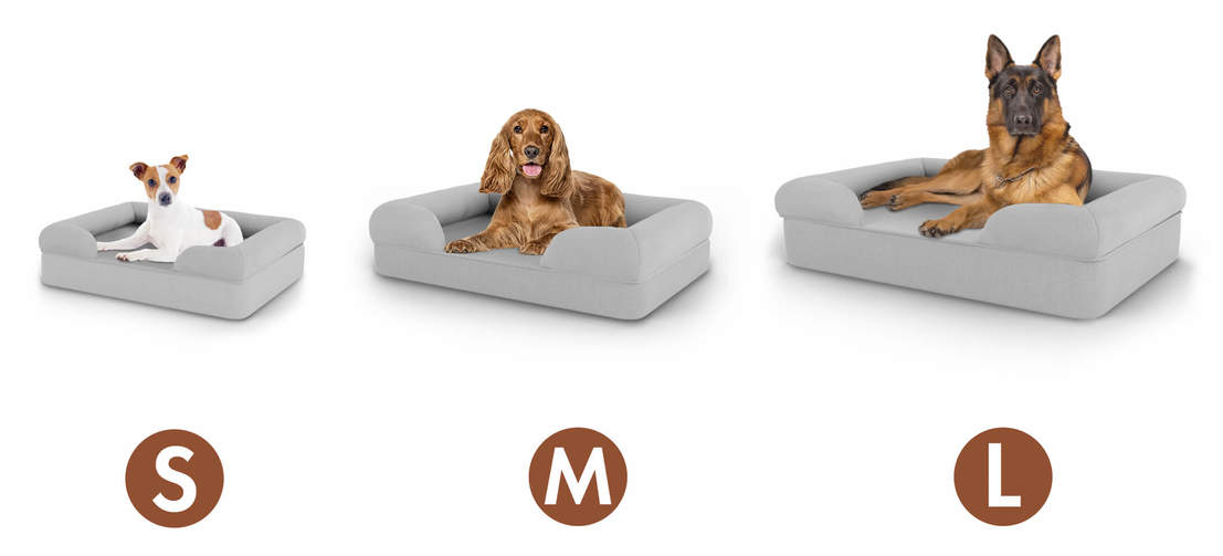 Small, Medium and Large Omlet bolster dog beds with a dog in each size bed