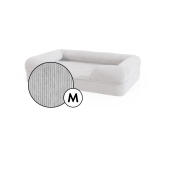 Medium bolster dog bed corduroy cover in pebble grey shade by Omlet.