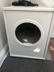 A white cat litter box