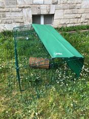 Omlet Zippi rabbit playpen in garden