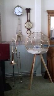 Omlet Geo bird cage with Gold cage, cream base and tall legs
