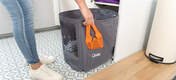 Pulling litter liner out of Maya cat litter box furniture