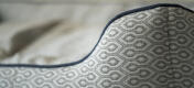 Close up of seam detail on honeycomb slate nest dog bed.