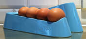 A blue egg ramp on a Golden work surface