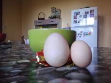 Two fresh eggs on a kitchen table