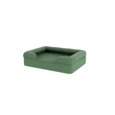 A green memory foam bolster dog bed.