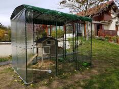 Wooden chicken coop in Omlet walk in chicken run