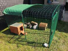 Omlet Zippi rabbit playpen with rabbits