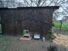 Door Omlet installed on a large wooden hen house. in 15 minutes, my hens were safe and i was relieved not to have to manage opening/closing.