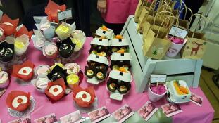 Lovely little egg boxes filled with carrot cakes at charity sale