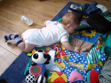 He rolled over for the first time at Superkate's house last week (12/09/06)