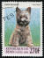 A cairn terrier on a west african stamp