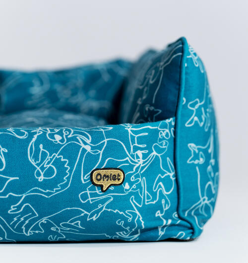 Close up of Omlet nest bed in the doodle dog print