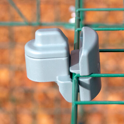 A close up image of the Zippi locks for a animal run