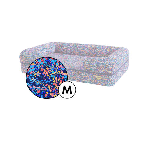 Medium bolster dog bed cover in patterpaws neon print by Omlet.
