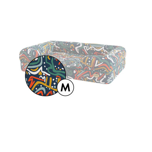 Medium bolster dog bed cover in zoomies print by Omlet.