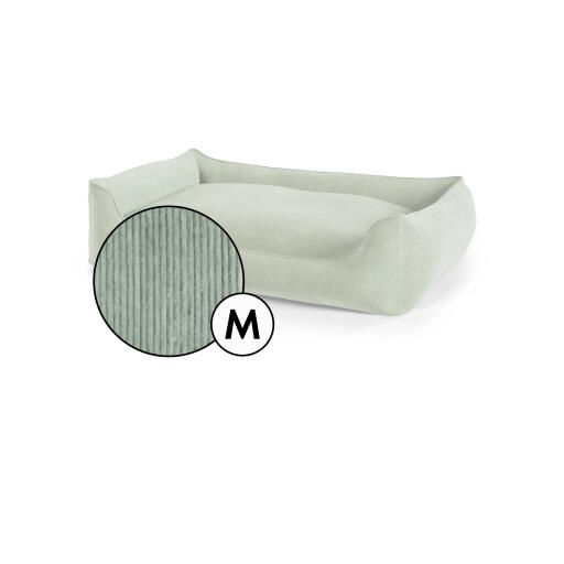 Medium nest dog bed corduroy cover in moss green shade by Omlet.