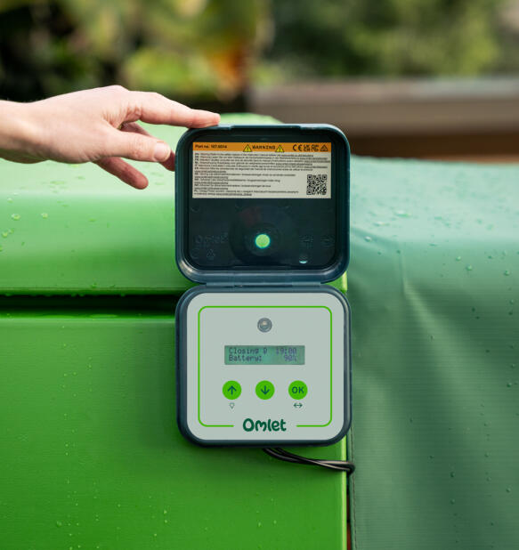 Close up of the Omlet smart automatic chicken coop door control panel