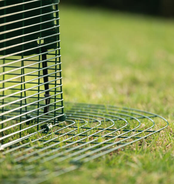 Close up of anti-tunnel predator proof skirting on the Eglu pro chicken coop run