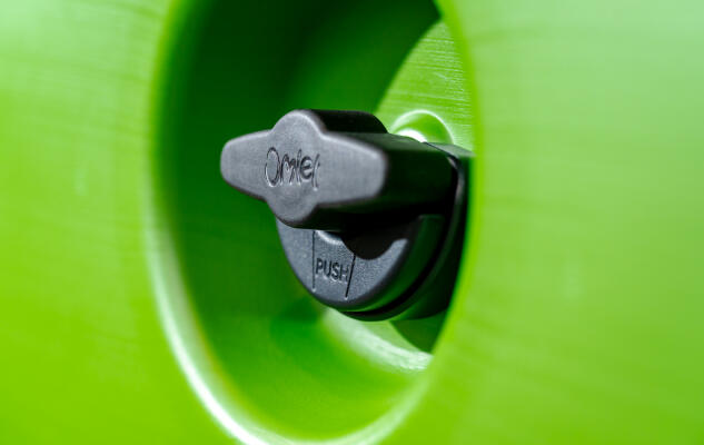 Closeup of the predator resistant lock for Eglu Cube chicken coop doors