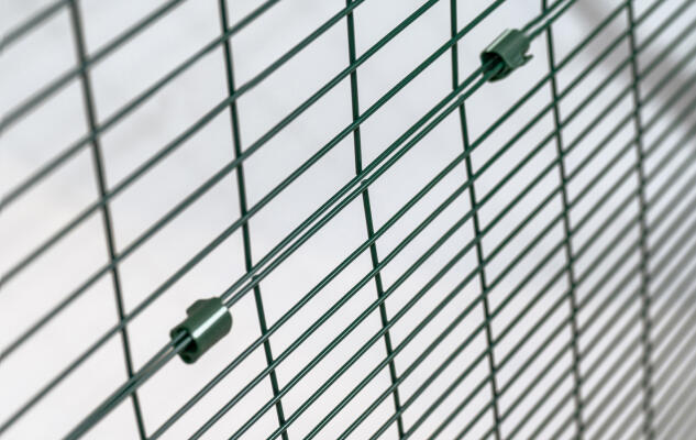 Closeup of the steel weld mesh of the Eglu Cube chicken coop run