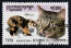 Postage stamp with a tortie manx cat on it