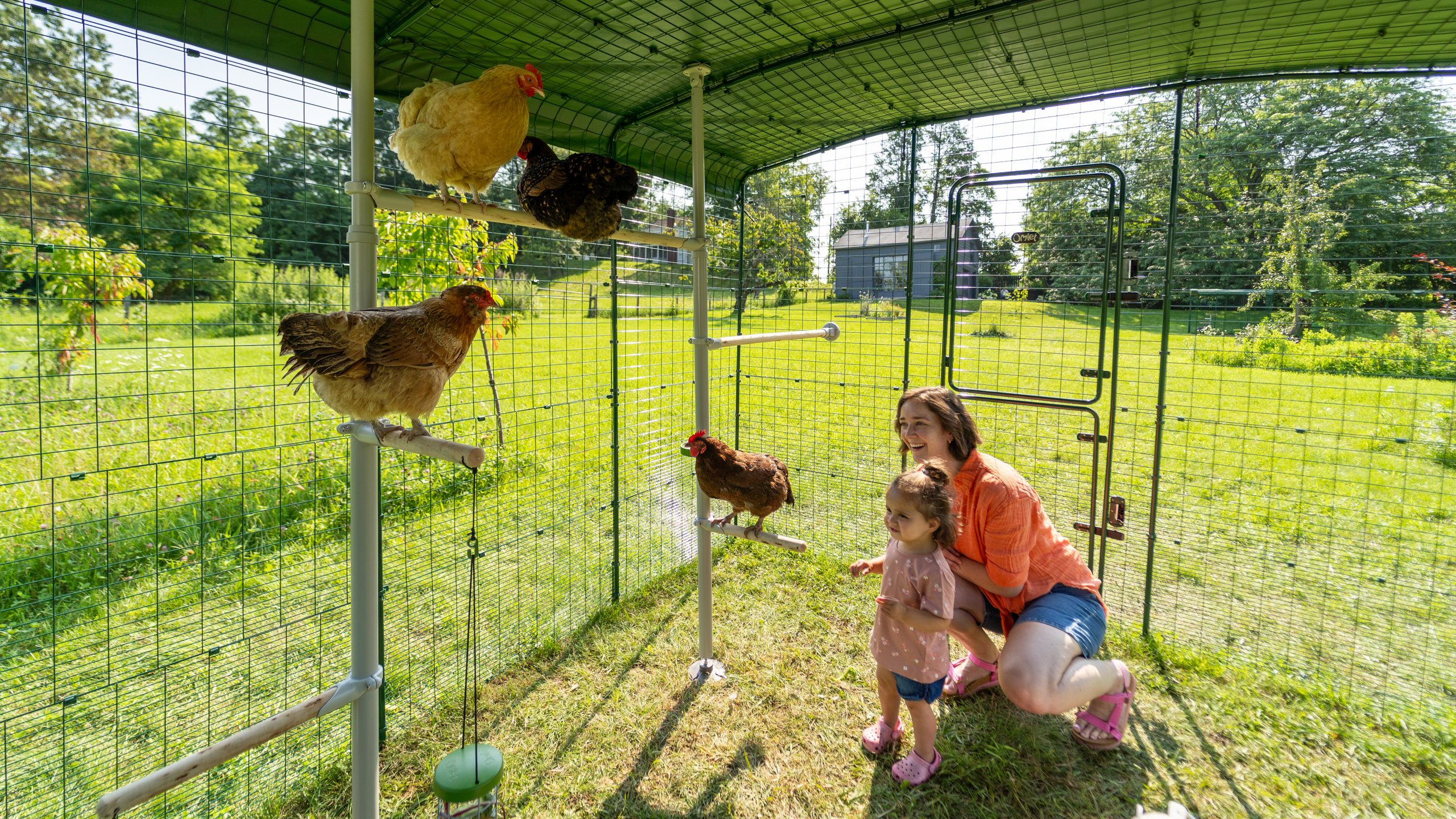 Woman and daughter in the Omlet Walk In Chicken Run