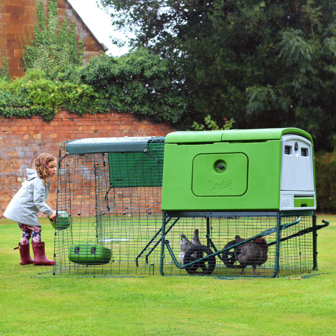 The Eglu Cube’s stable style run doors make it easy to replenish your chicken’s feed and water.