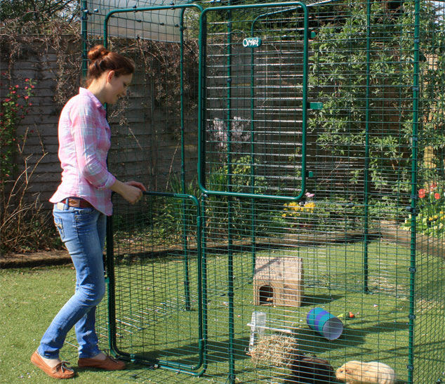 The High-Rise Outdoor Guinea Pig Run has a full height stable door making it easy to throw in some treats.