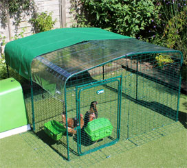 Omlet Outdoor Rabbit Run with clear and green roof covers.