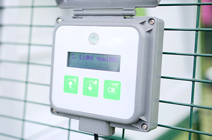 The control panel features the light sensor for the Autodoor